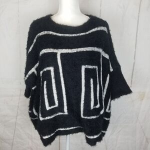One A boxy short sleeve sweater